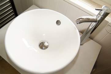 The bathrooms are contemporary throughout.