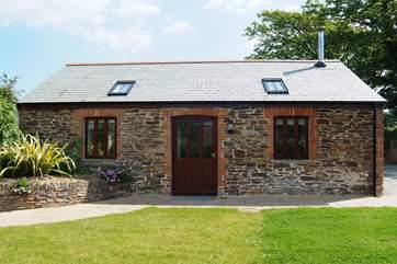Two Whitawoo has an enclosed garden and large patio-area.