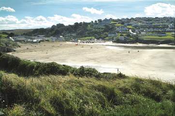 Polzeath beach is a great sandy beach at low tide.