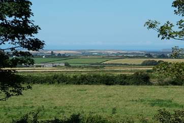 The wonderful view from the first floor across open countryside to the stunning north Cornwall coastline.