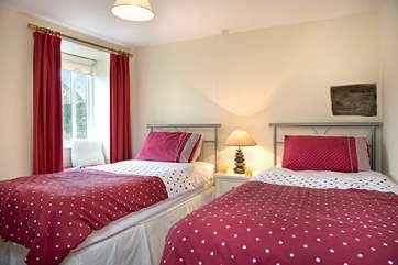 The pretty twin bedded room.