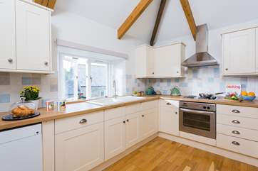 The well-equipped kitchen is on the first floor just along from the living-room.