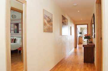 The wide hallway and extra wide doors make the apartment easy for wheelchair users (there is a bathroom with bath and an en suite shower-room with a standard shower cubicle).