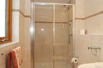 The shower-room en suite to Bedroom 1.