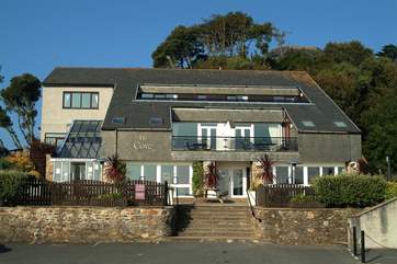 The Cove bar and bistro is just behind Maenporth beach and has a very good reputation.
