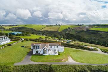 Silver Spray is surrounded by large lawned areas. The countryside behind the house is as stunning as the seaviews