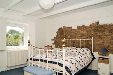 This double bedroom (Bedroom 3) has a lovely brass bed.