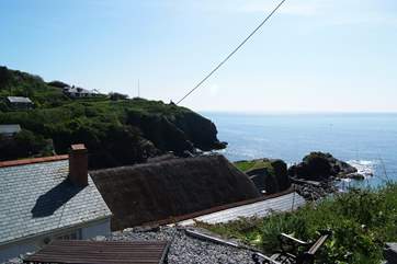 The garden is up behind the cottage (take care on the steep steps and the unfenced top terrace).