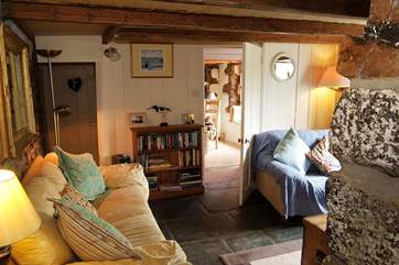 Room to relax with friends and family in this cosy cottage sitting-room.