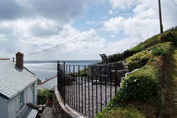 The railings to the rear of the cottage lead up to your private terrace.