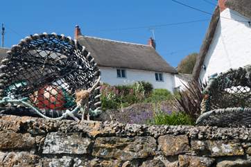 This lovely thatched cottage in the heart of this very pretty seaside village.