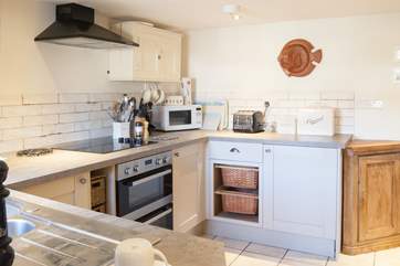 When cooking or washing up in the well-equipped kitchen, you can enjoy views of the village from the window.