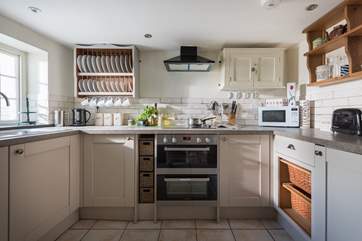The kitchen is well-equipped for your every need.