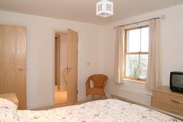 The master bedroom (Bedroom 1) has views towards the sea.