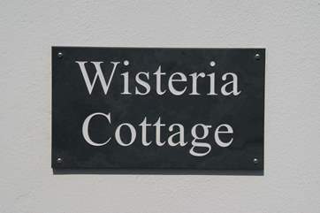 The slate sign outside the door.