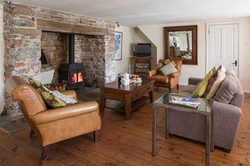 The wood burner makes this living room the perfect place to relax and unwind after a action packed day.