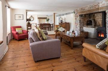 The spacious living room offers plenty of comfy seating.