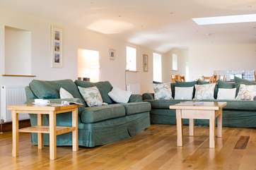 The sitting-area with polished oak floors.