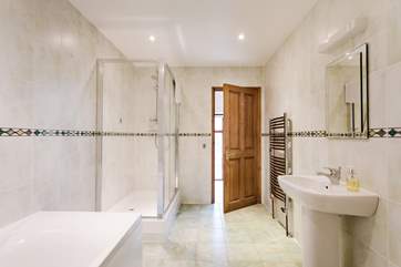 The bathroom with the shower at the far end.
