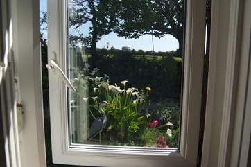 The kitchen window looks out over the pond.