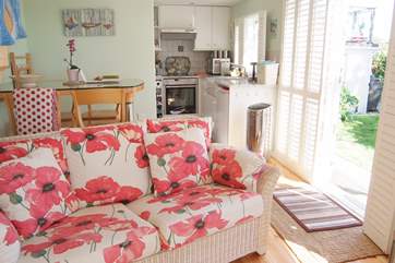 The pretty open plan living-room.