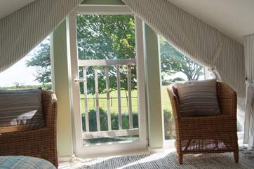 The view out of the big window at the front of the bedroom.