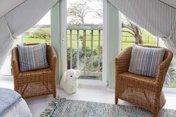 Jack and Jill chairs compliment the bedroom and the view!