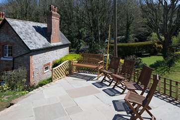 Looking down from the top patio to the cottage below.