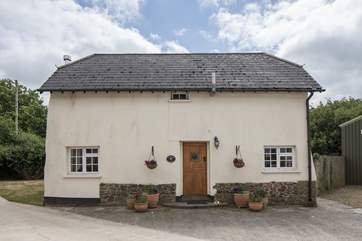 Cherryblossom Cottage sits at the edge of the farmyard and has a private rear garden.