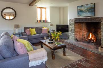 The open fire adds cosy character to this lovely cottage.