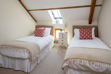 The bright twin bedroom has 3ft beds that can be combined to create a 6ft super King size bed.