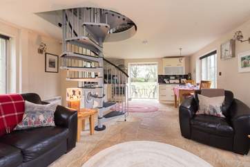 The open plan layout of the ground floor means that this gorgeous bolt-hole is filled with light.