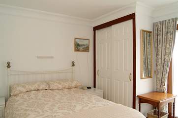 The master bedroom has a double bed (Bedroom 1).