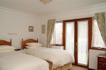 The second bedroom has 'zip and link' beds, shown here as 3' twin beds and also available as a 6' double bed (Bedroom 2).