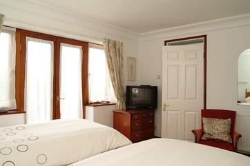The second bedroom has an en suite shower room.