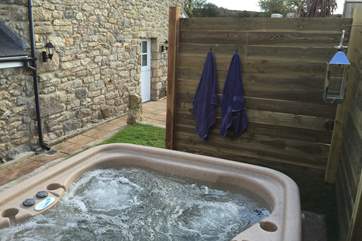 The hot-tub is behind the cottage and in its own little enclosure so privacy is guaranteed.