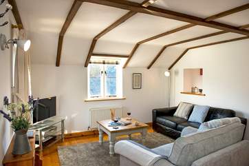 The comfortable sitting-room is very welcoming.