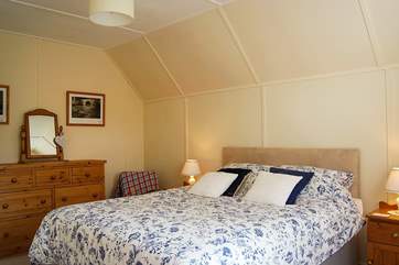Bedroom 2 is spacious with plenty of room for a travel cot if required.