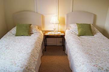 Twin beds in Bedroom 3.