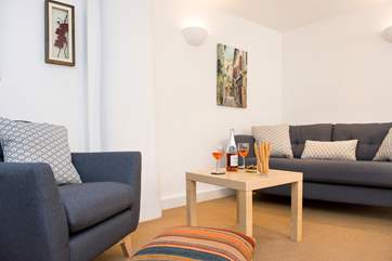 The sitting-room is the ideal place to relax after a busy day exploring the North Cornish Coast.