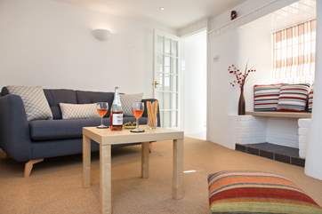 There is a very comfy sofa in the sitting-room.