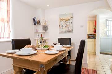 The dining-room leads through to the kitchen.