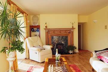 There is a warming electric stove in the sitting-room.