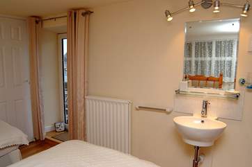 Bedroom 2 on the first floor also has views of the harbour.