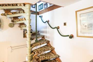 The narow stairs up to the first floor.