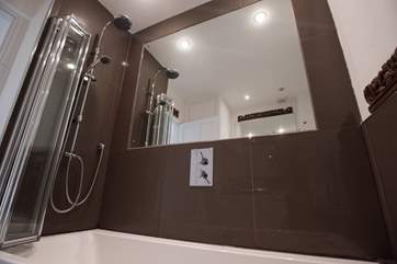 The bathroom has a fitted shower.