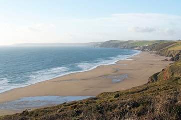 A footpath wends its way down the cliff to wonderful Long Sands below Tregantle Fort.