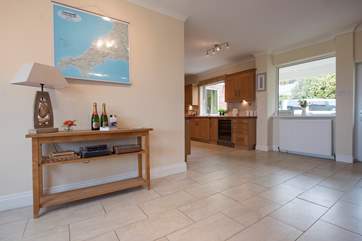 The kitchen-area is around the corner from the dining-area.