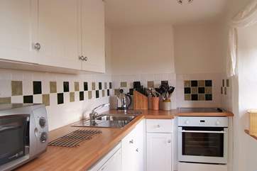 The small but well-equipped kitchen.