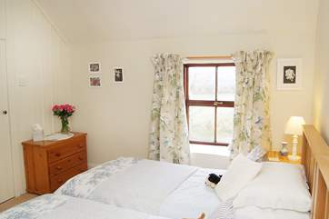 The twin bedroom also has wonderful countryside views towards the reservoir.